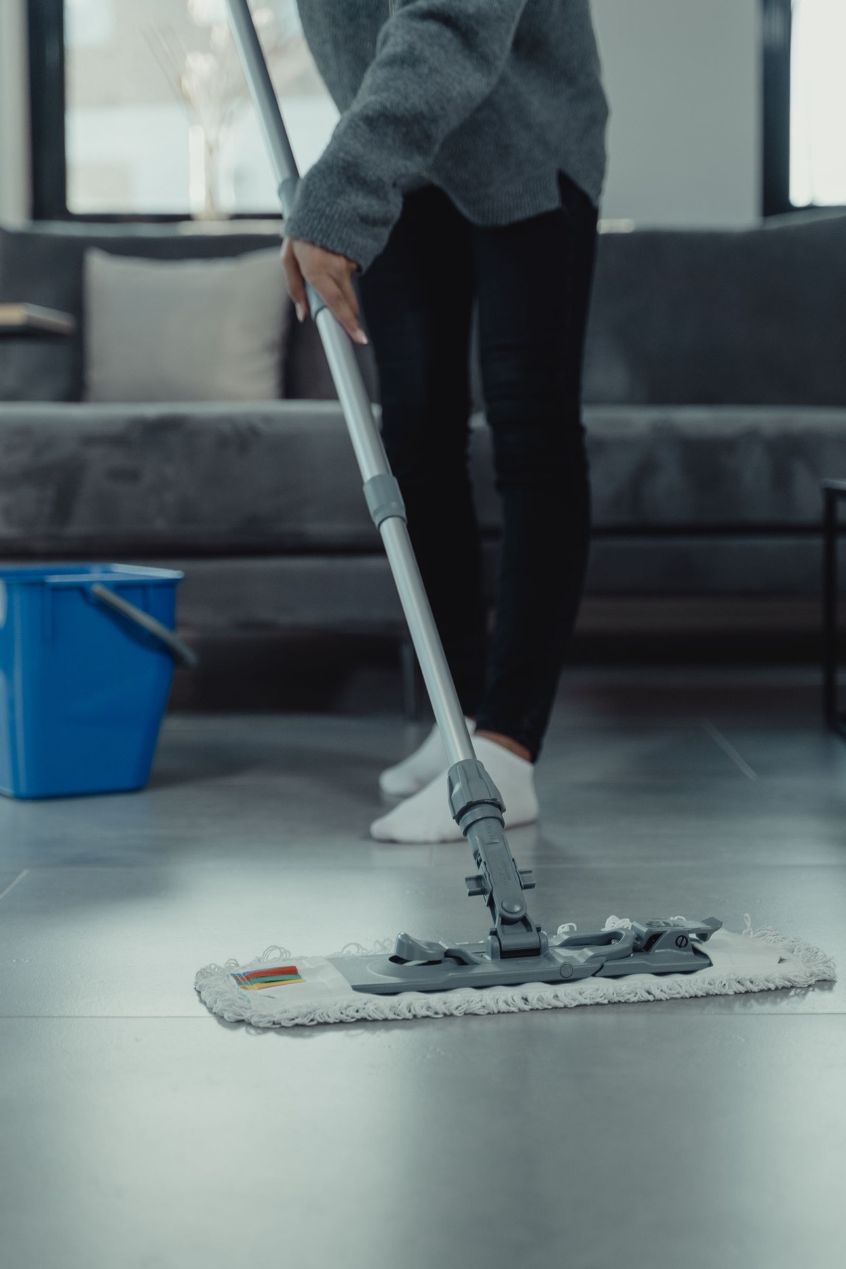 Mopping a tiled common area floor